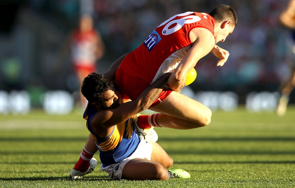 AFL 2019 Round 12 - Sydney v West Coast SYDNEY, AUSTRALIA - JUNE 09: Colin O'Riordan of the Swans is tackled Willie Rioli of the Eagles during the round 12 AFL match between the Sydney Swans and the West Coast Eagles at Sydney Cricket Ground on June 09, 2019 in Sydney, Australia. (Photo by Mark Kolbe/Getty Images)